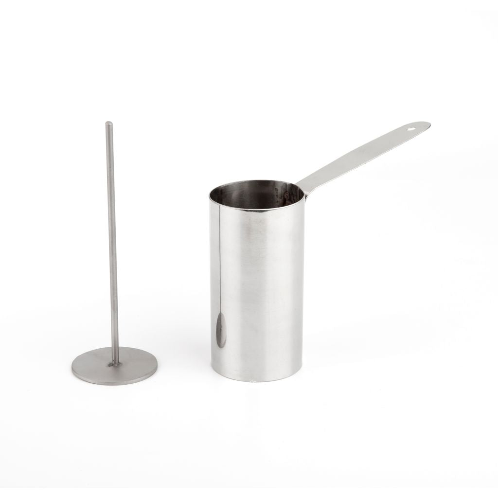 Cylinder form i rustfrit stål med stempel til anretning